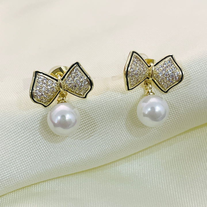 Aretes Acero Lazo🎀 con perla colgante