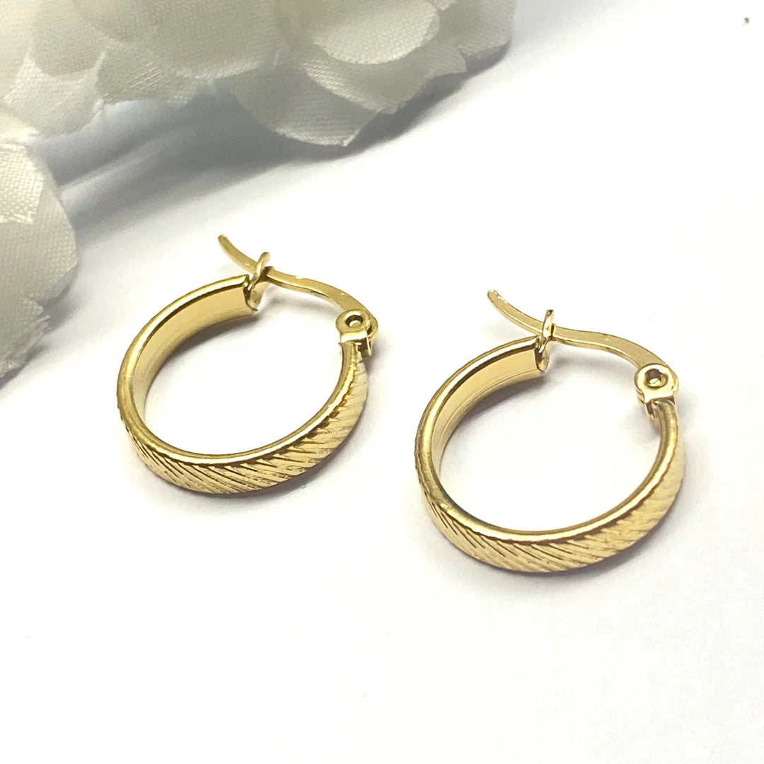 Argollas Acero 💗 Rayadas