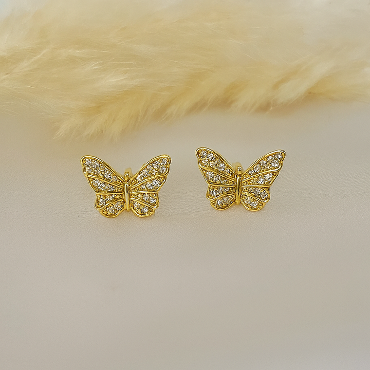 Aretes de Acero Dorado Reflejo de Mariposa🦋