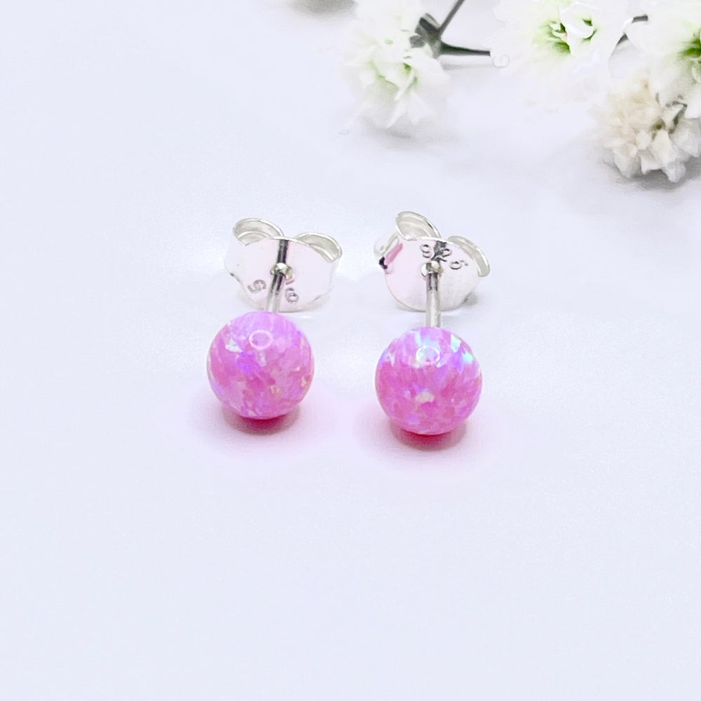 Compra online unos hermosos de aretes redondos con la piedra ópalo 💙 en Costa Rica 🇨🇷