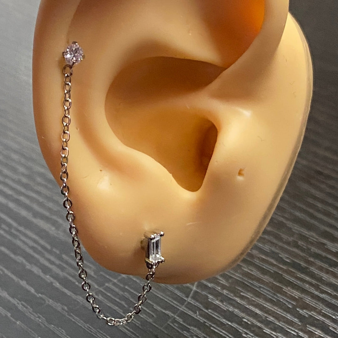 Arete Quirúrgico 💙 Plateado Con Cadena