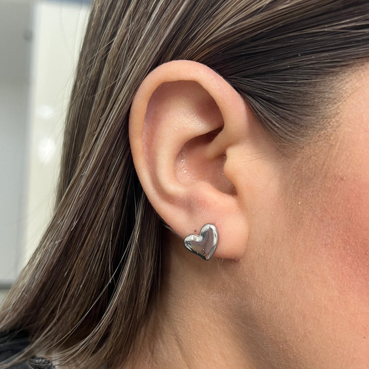 Aretes de Acero Corazón de Luz Plateada