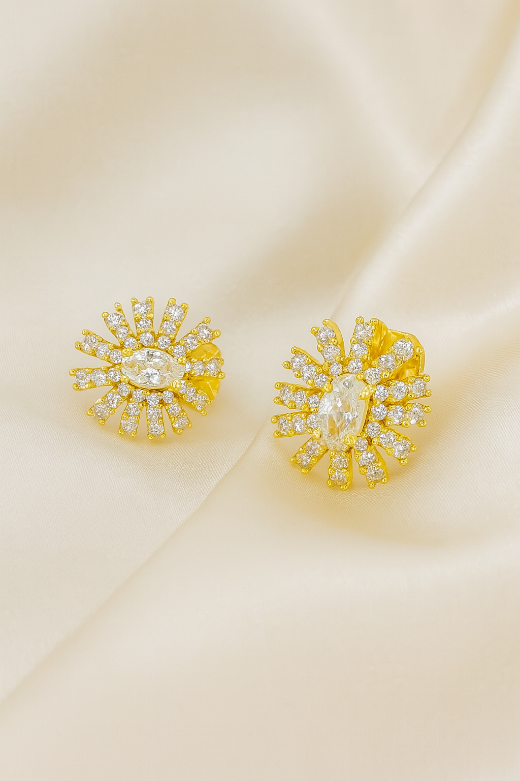 Aretes de Acero Prensa Dorada Saura