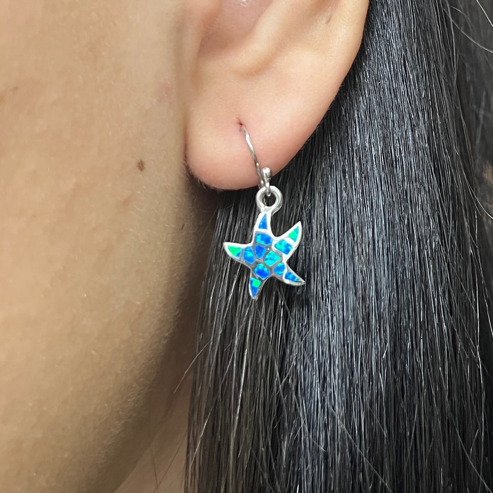 Compra en línea hermosos aretes de estrella de mar en plata con ópalo