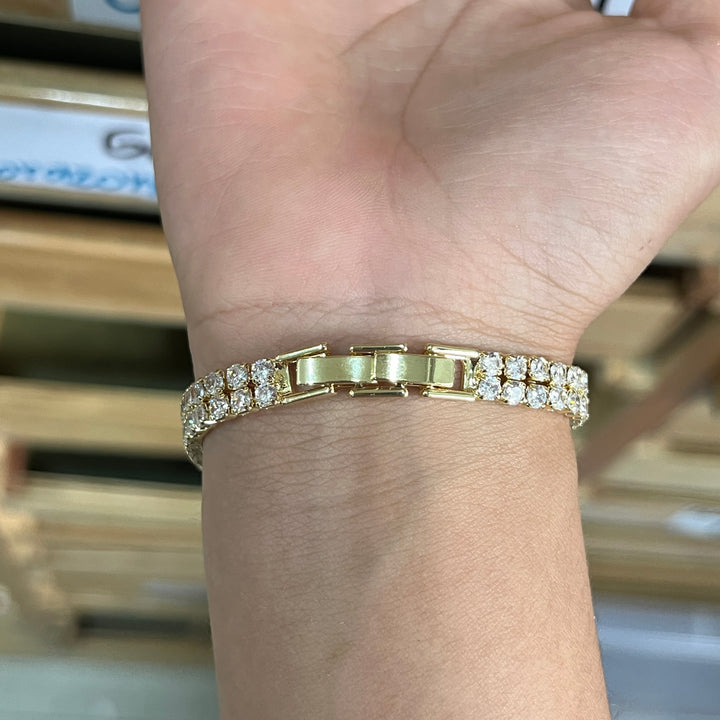 Pulsera Acero Circonias dos filas Dorada