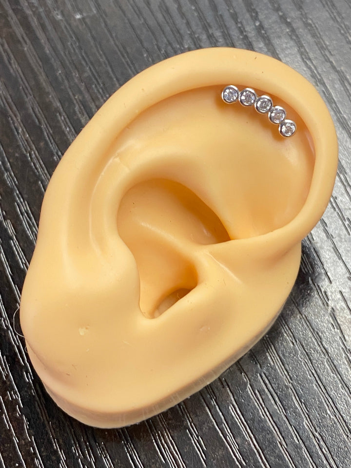 Arete Quirúrgico 💙 Curvo Plateado