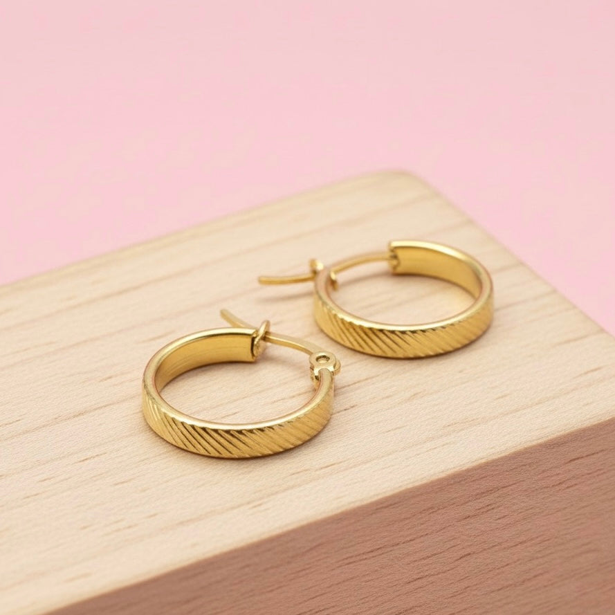 Argollas Acero 💗 Rayadas