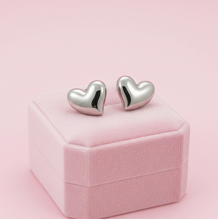 Aretes de Acero Corazón de Luz Plateada
