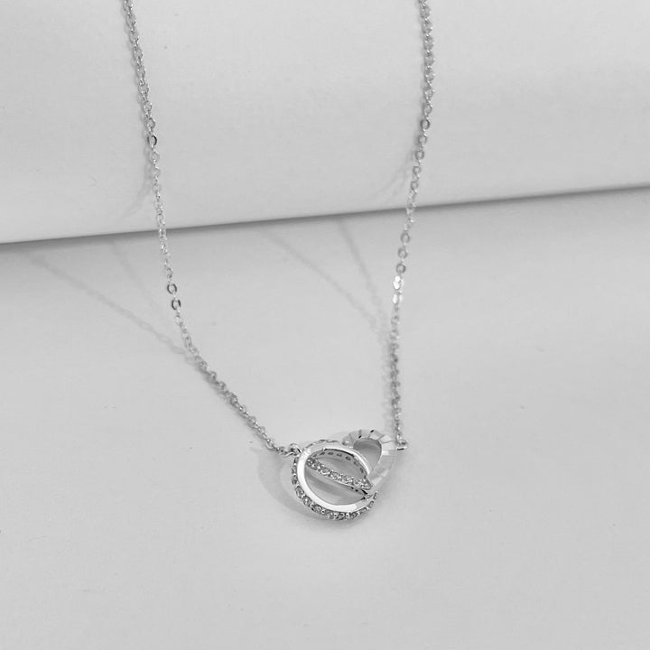 Collar de Acero Círculo y Corazón Plateada