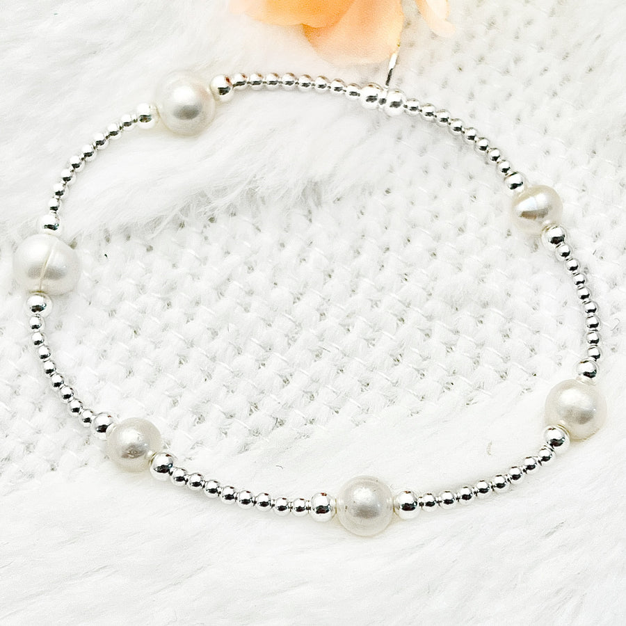 Pulsera elastica de plata con perlas cultivadas 