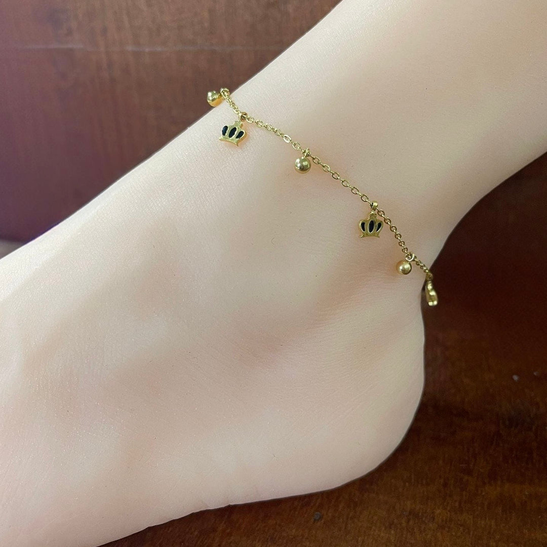 Tobillera Acero Dorada Coronas Negras👑