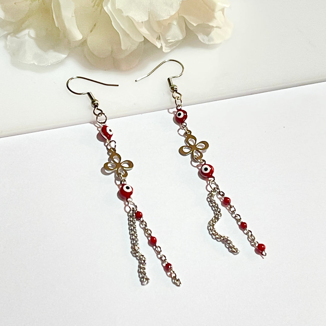 Aretes de Acero Ojo Turco Rojo Flor 🌹