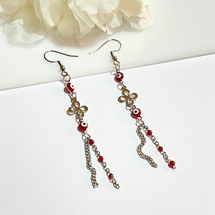 Aretes de Acero Ojo Turco Rojo Flor 🌹