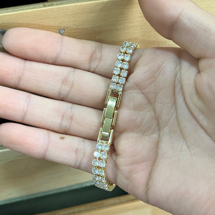Pulsera Acero Circonias dos filas Dorada
