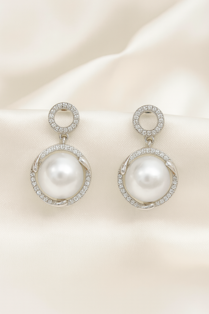 Aretes Plateados colgantes de Perla