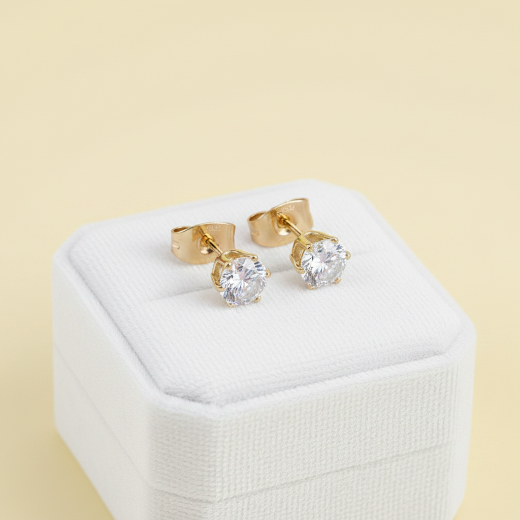 Aretes Chispas de Acero Doradas