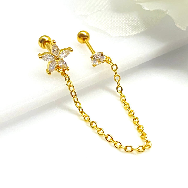 Arete Quirúrgico 🌼 Flor Dorado Con Cadena