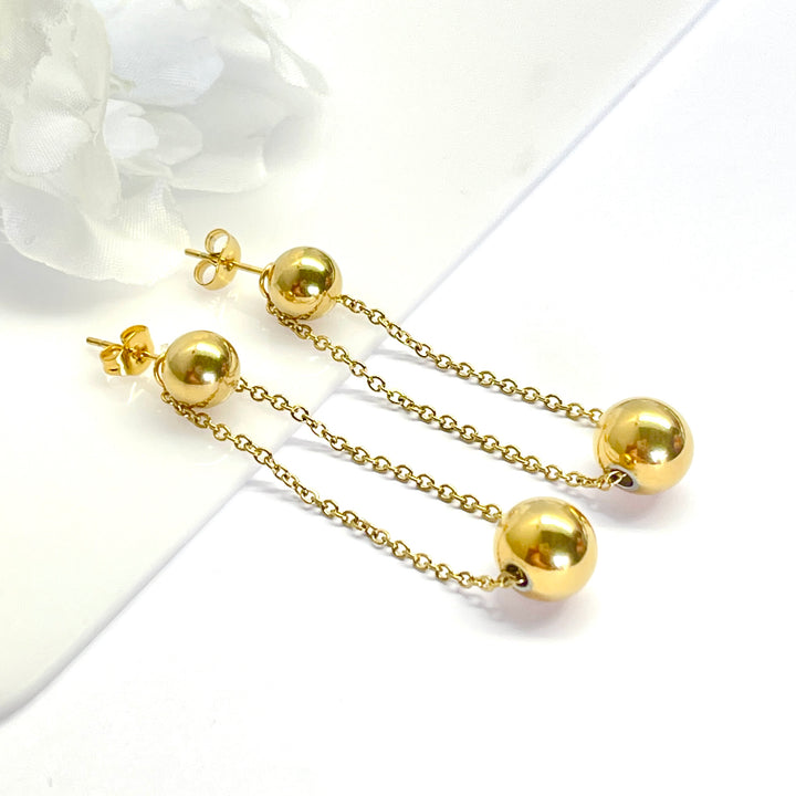 Aretes de Acero Largos Bola 🌈 Dorado | Nicola joyería 