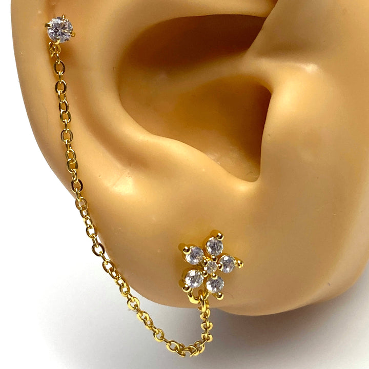 Arete Quirúrgico 🌼 Flor Dorado Con Cadena
