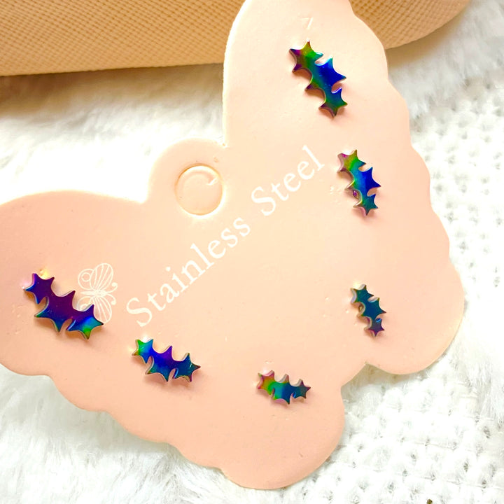 Trío de Aretes Estrellas Tornasol