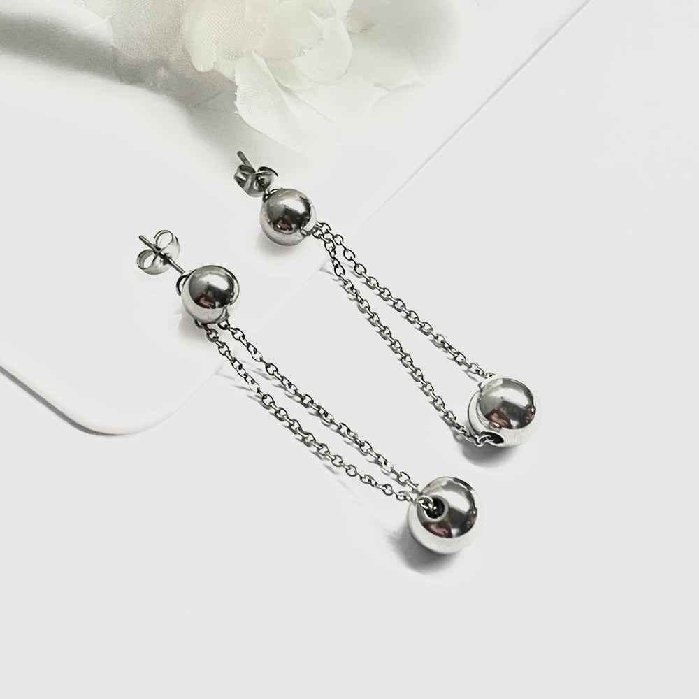 de Aretes de Acero Largos Bola 🦄 Plateada| Nicola joyería 