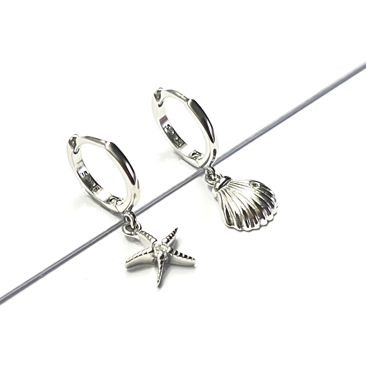 Huggies Plata 💎 Concha y Estrella | Nicola Joyeria 
