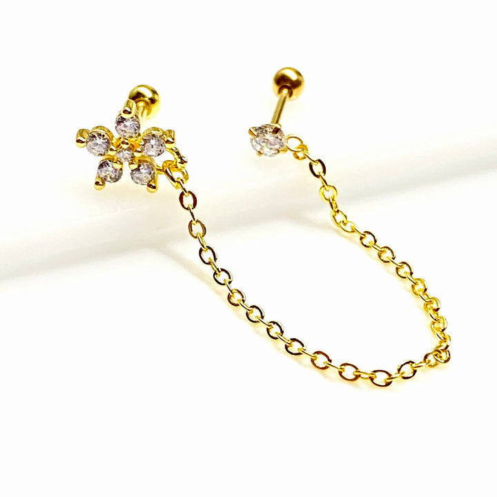 Arete Quirúrgico 🌼 Flor Dorado Con Cadena