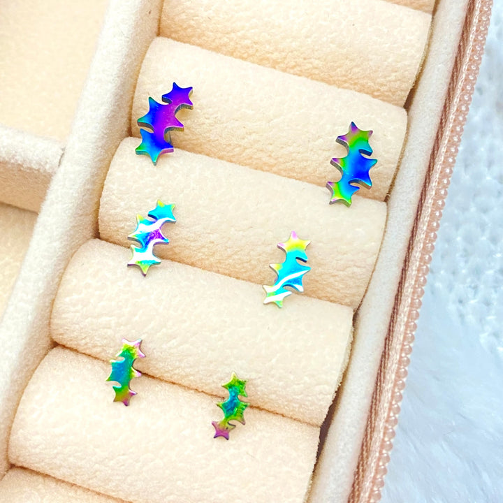 Trío de Aretes Estrellas Tornasol