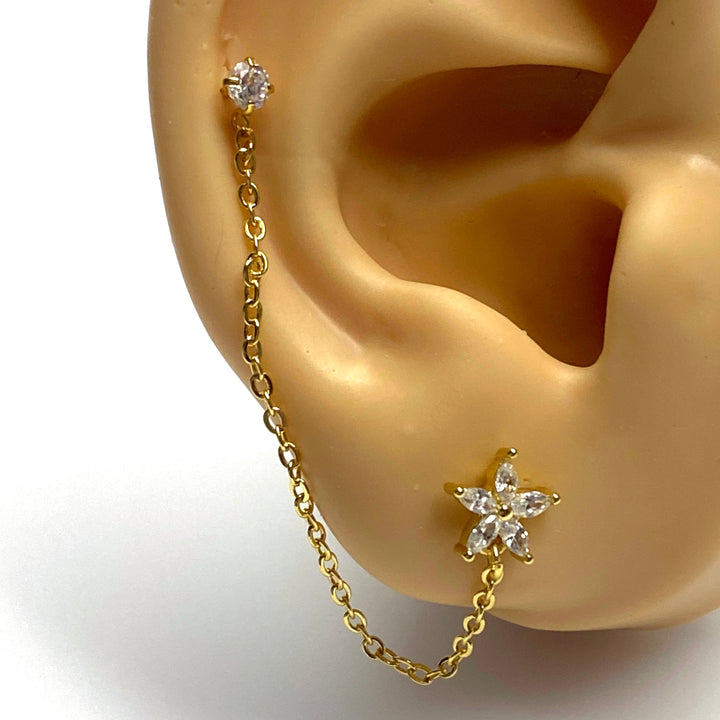 Arete Quirúrgico 🌼 Flor Dorado Con Cadena